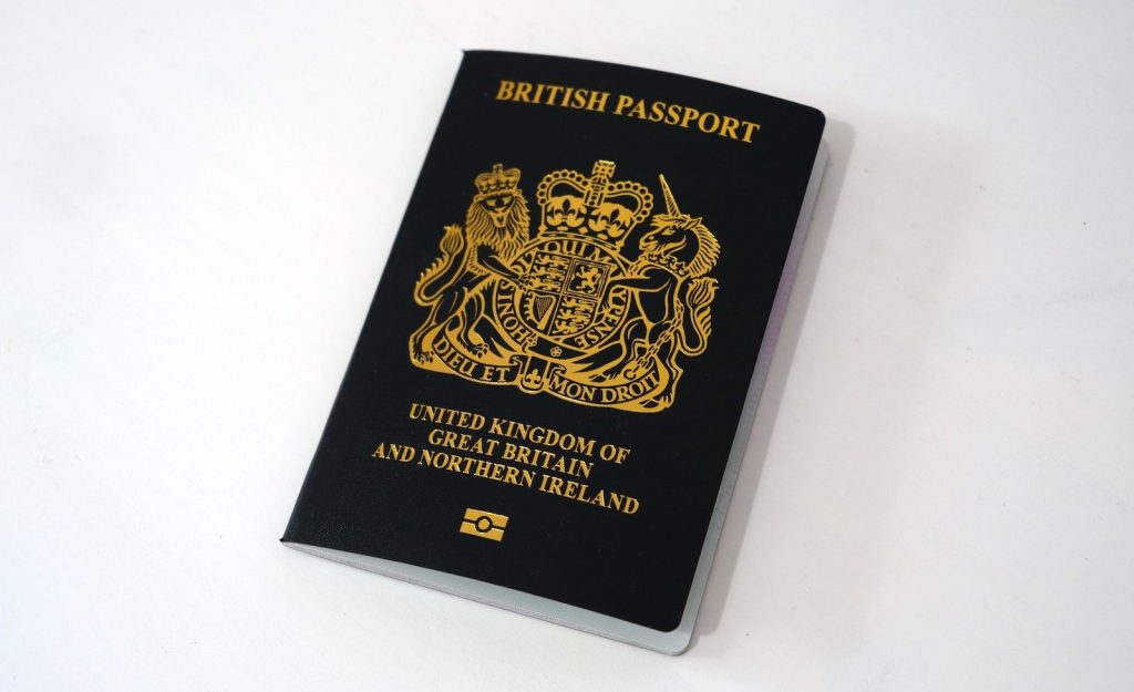 black and gold book on white table